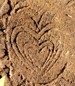 Heart footprint in the dirt